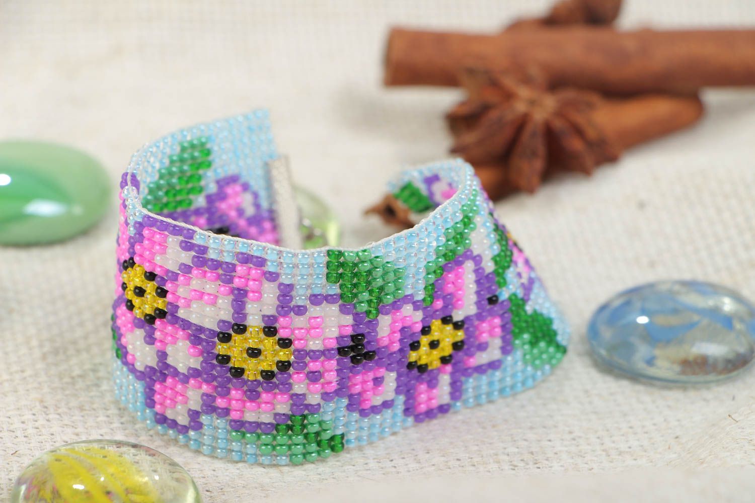 Handmade wide wrist bracelet woven of blue and violet beads with floral motives  photo 1