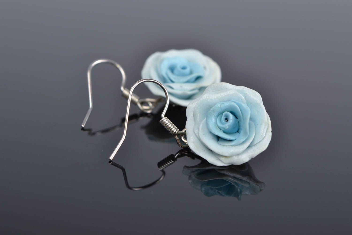 Handmade designer polymer clay earrings in the shape of tender small blue roses photo 1