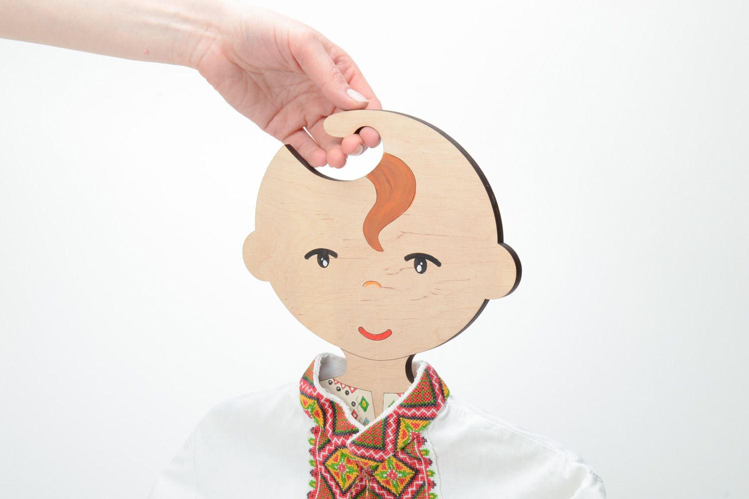 Beautiful plywood children's clothes hanger in the shape of boy photo 5
