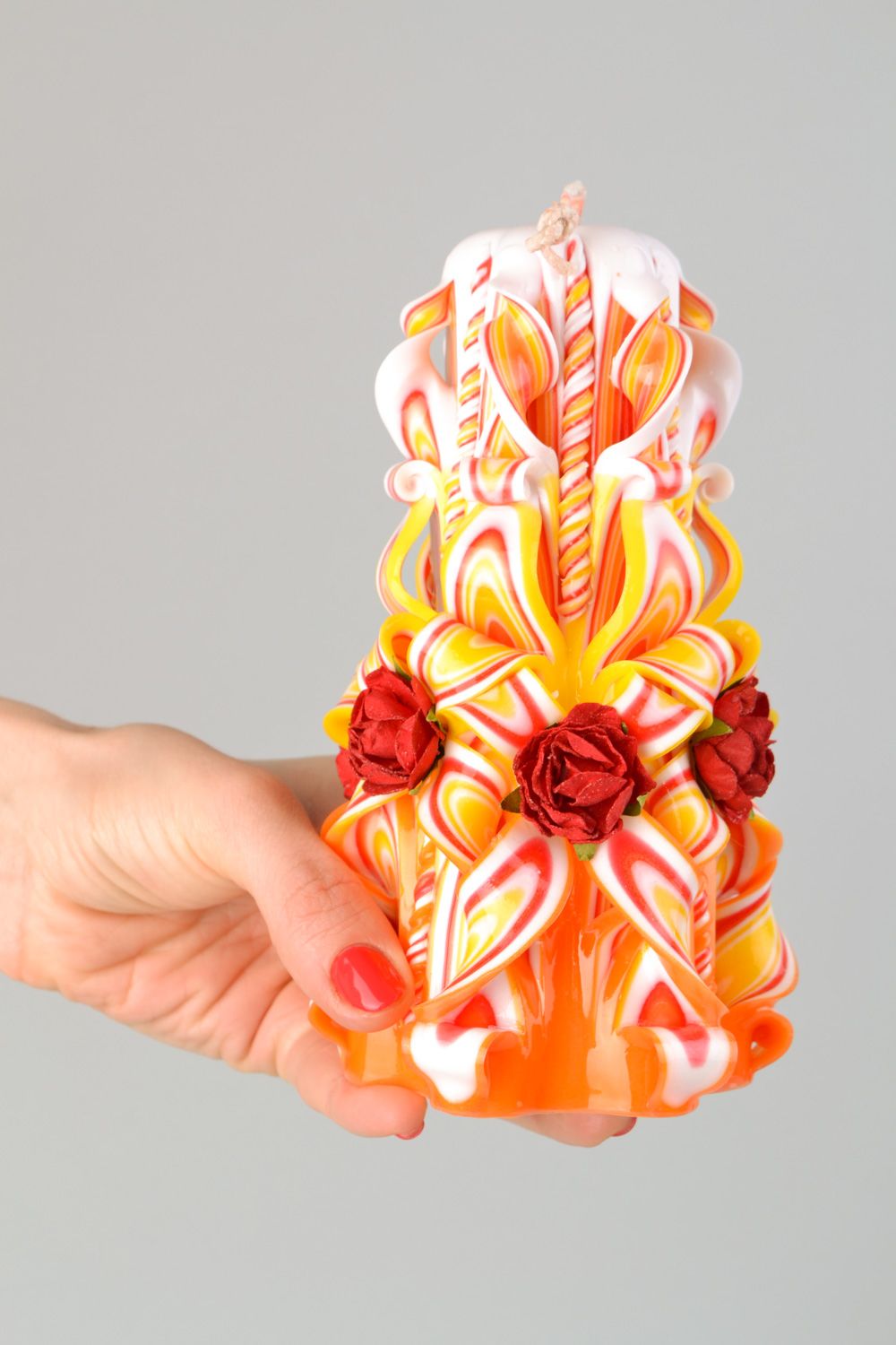 Handgemachte vielfarbige große Kerze aus Paraffin mit Rosen für Haus Dekoration  foto 2