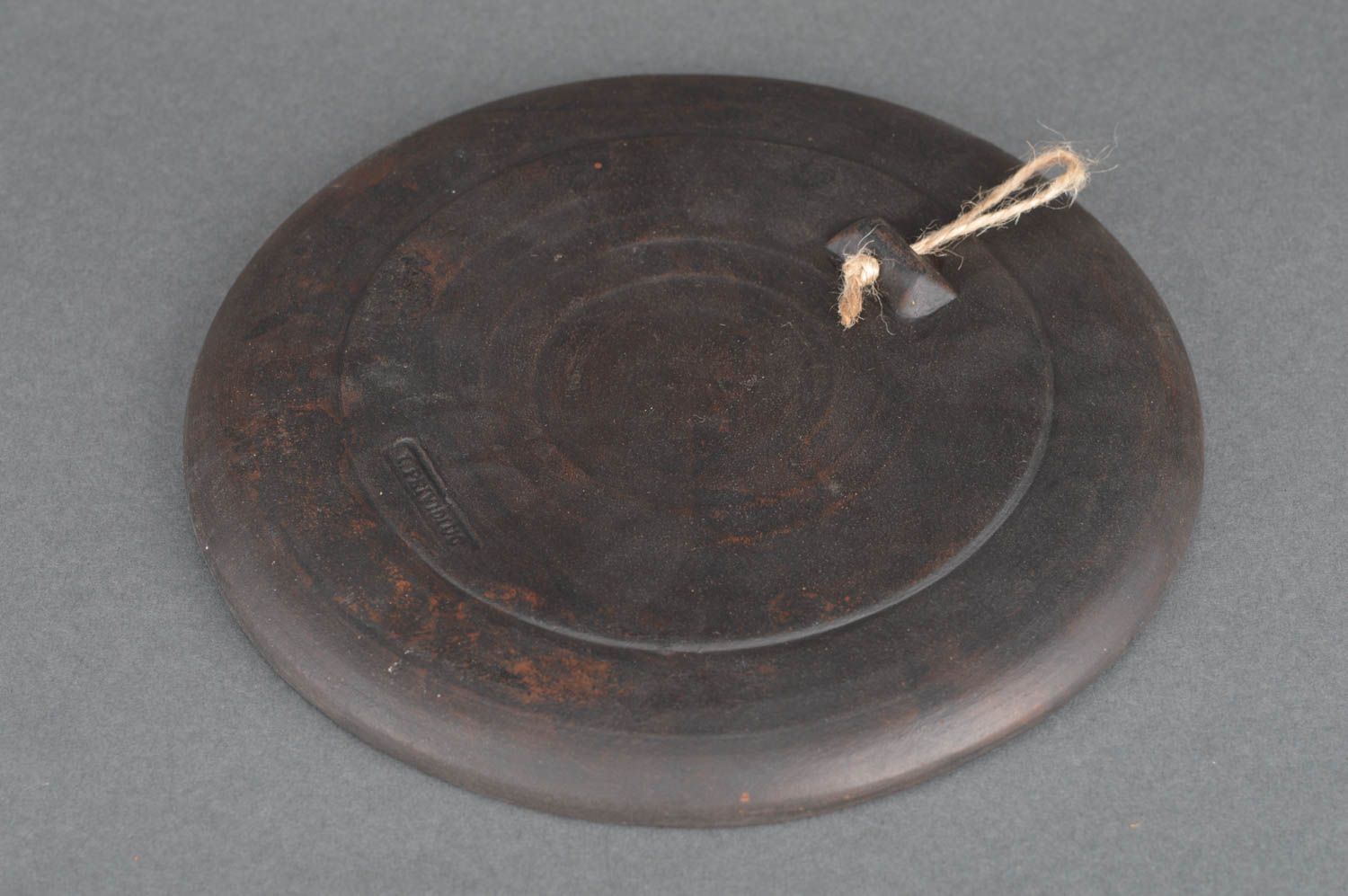 Decorative handmade round wall hanging dark brown ceramic plate in ethnic style photo 5