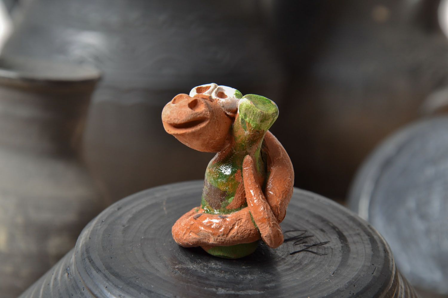 Clay snake figurine photo 1
