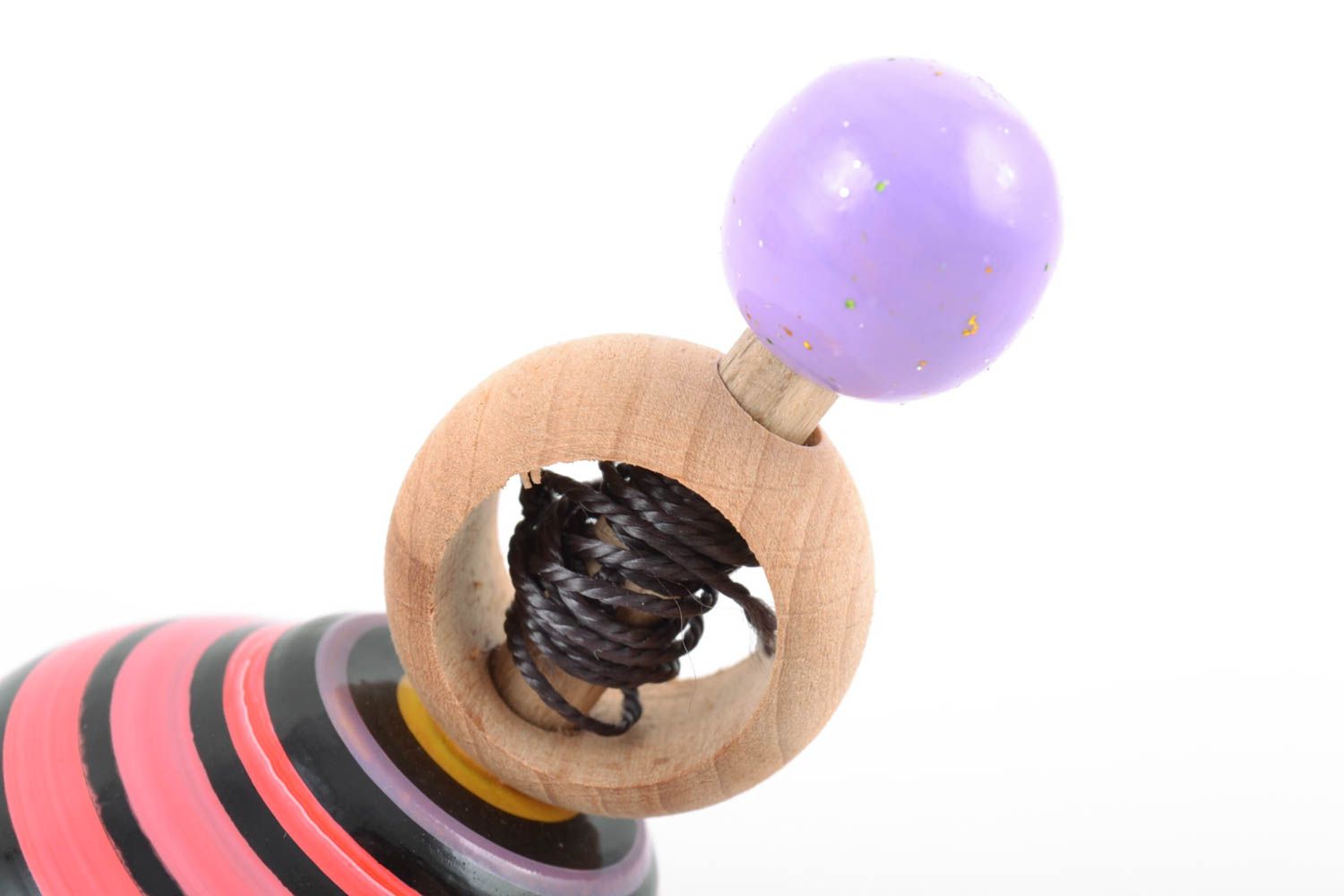 Bright small striped handmade wooden spinning top for children photo 5
