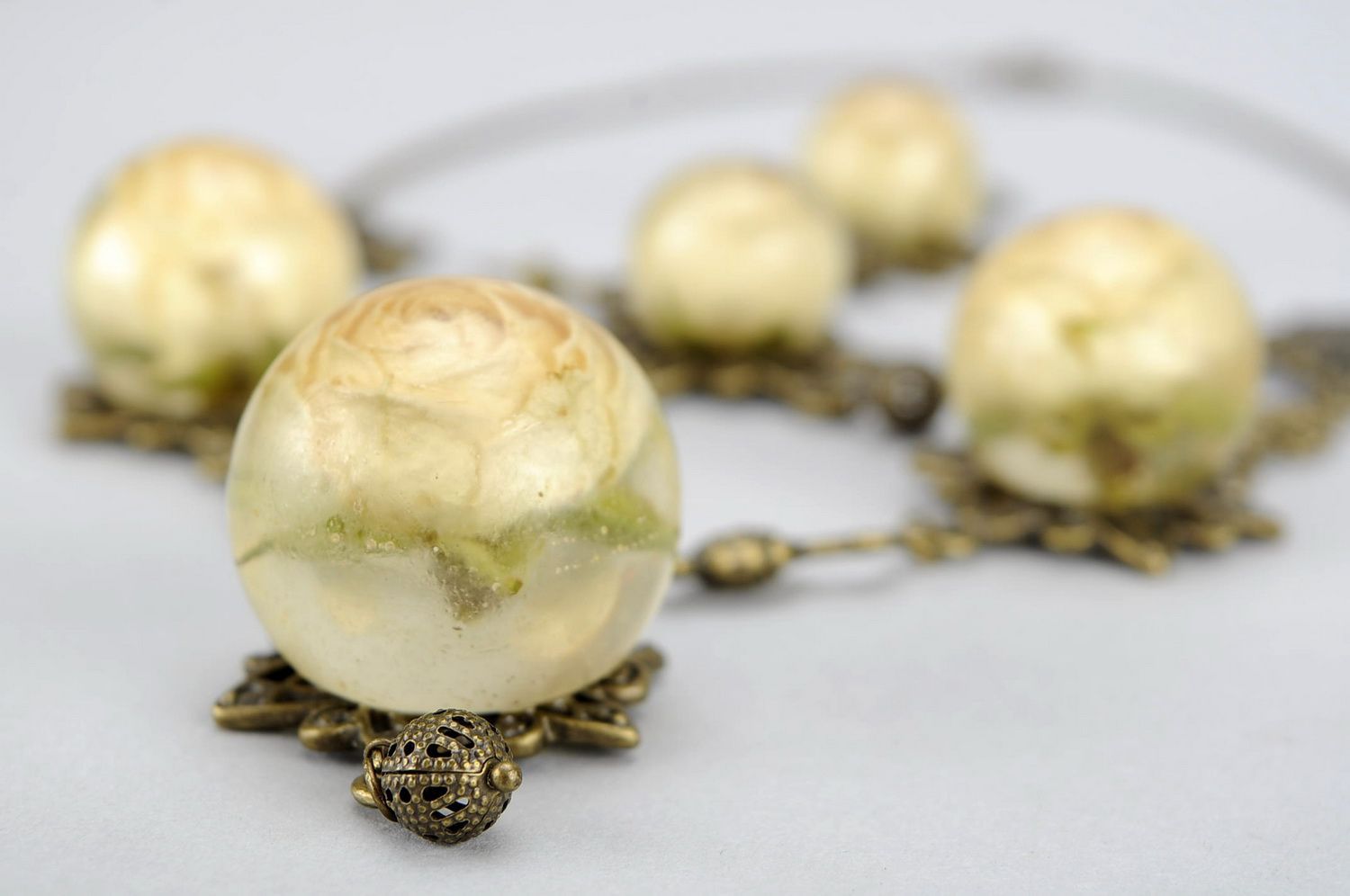 Jewelry set with epoxy resin: earrings, pendant photo 1