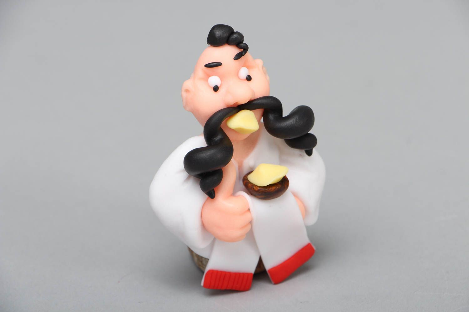 Polymer clay fridge magnet Cossack with Dumplings photo 1
