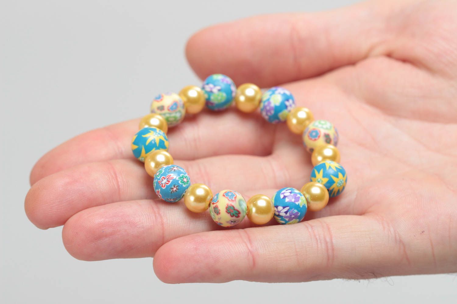 Homemade children's wrist bracelet created of polymer clay and ceramic beads photo 5