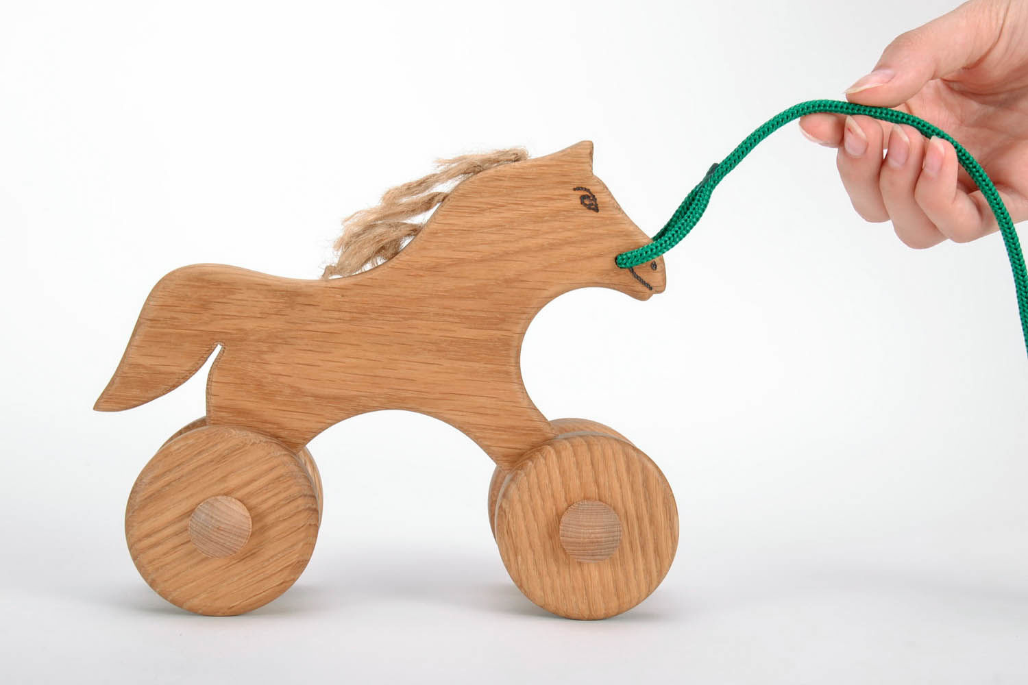 Brinquedo de madeira em rodas Cavalo foto 2
