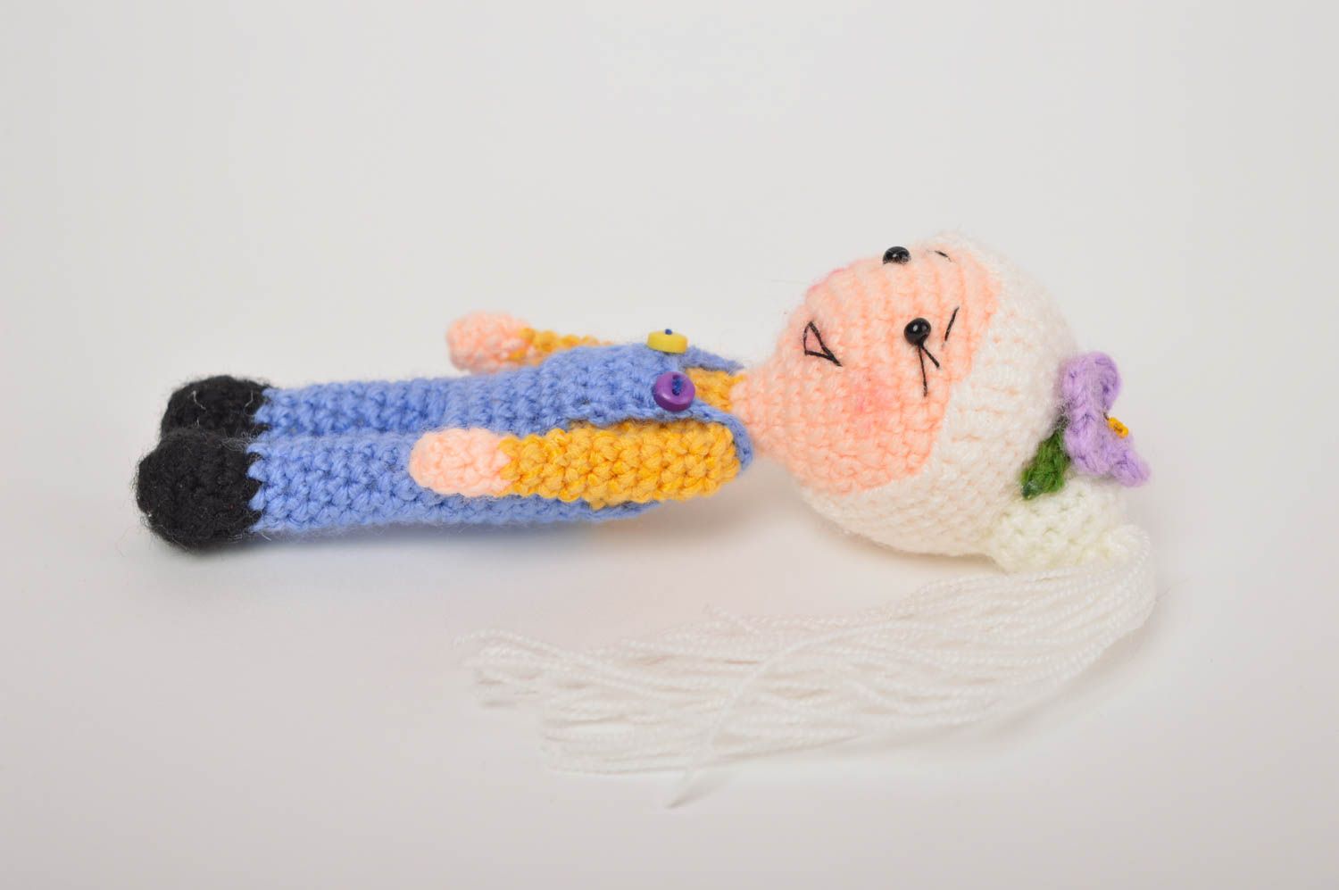 Knitted stuffed girl toy in blue jeans and pink sweater and blond hair. 4 inches tall photo 4