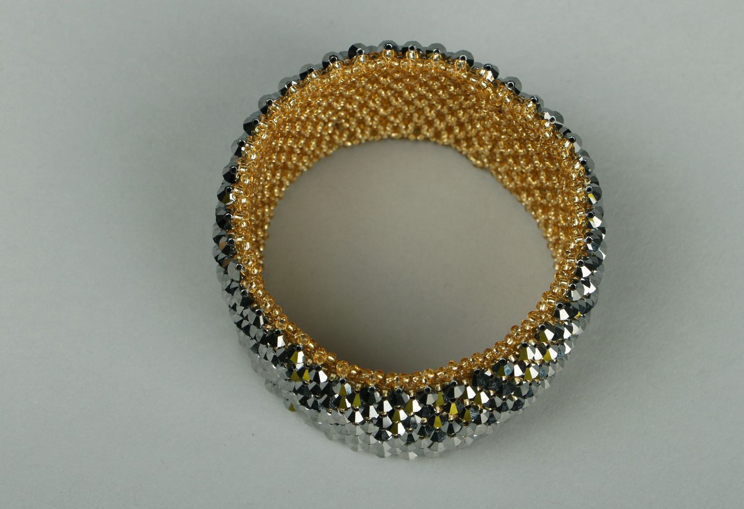 Bracelet made of czech crystal bicones Golden photo 2