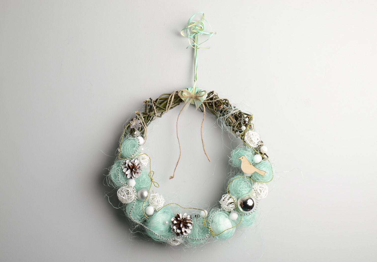 Handmade Christmas door wreath created of branches for interior decoration photo 1