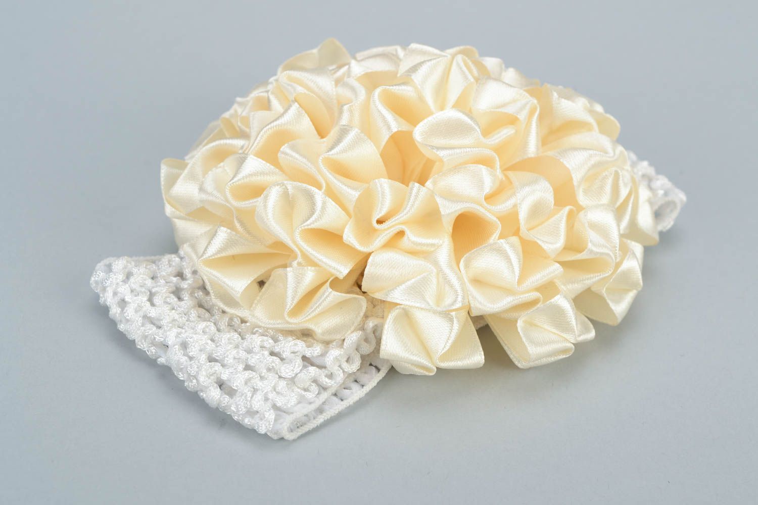 Handmade decorative elastic headband of milky color with flower for baby girl photo 4
