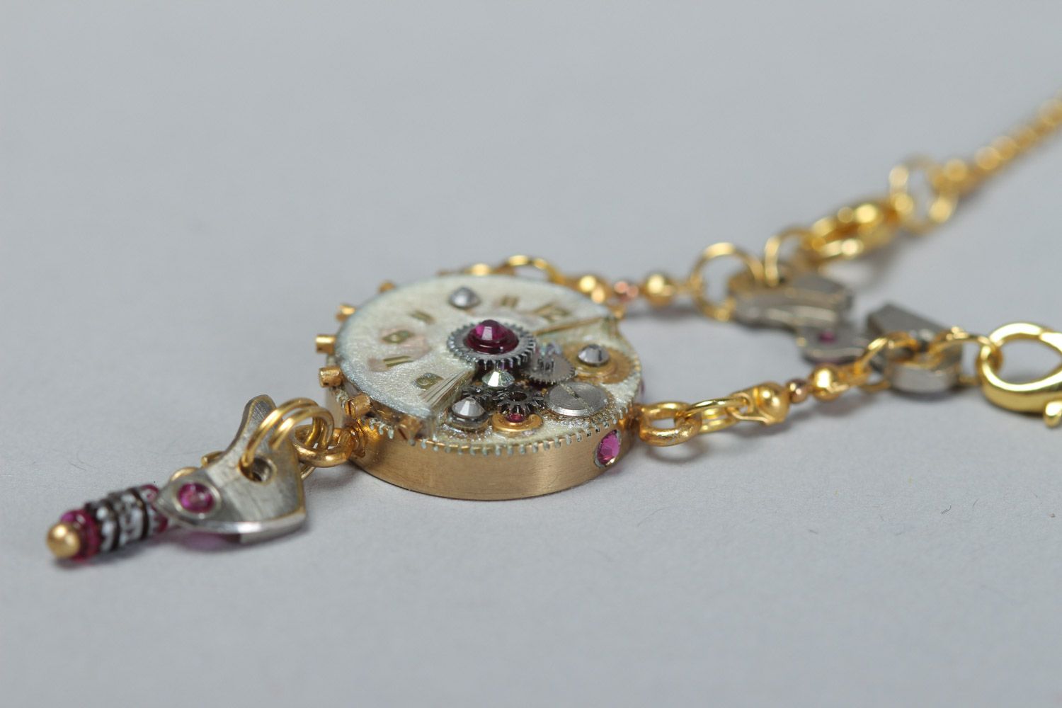 Women's handmade metal neck pendant with clockwork details in steampunk style photo 3