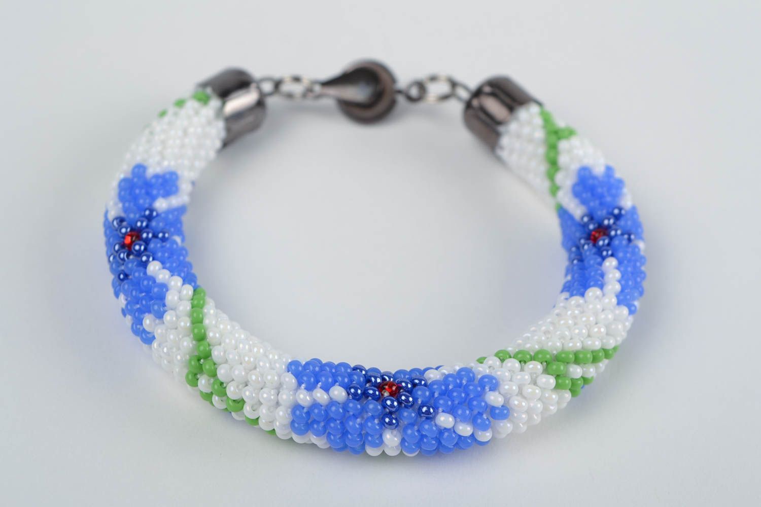 Handmade festive beautiful beaded cord bracelet white with blue flowers photo 4