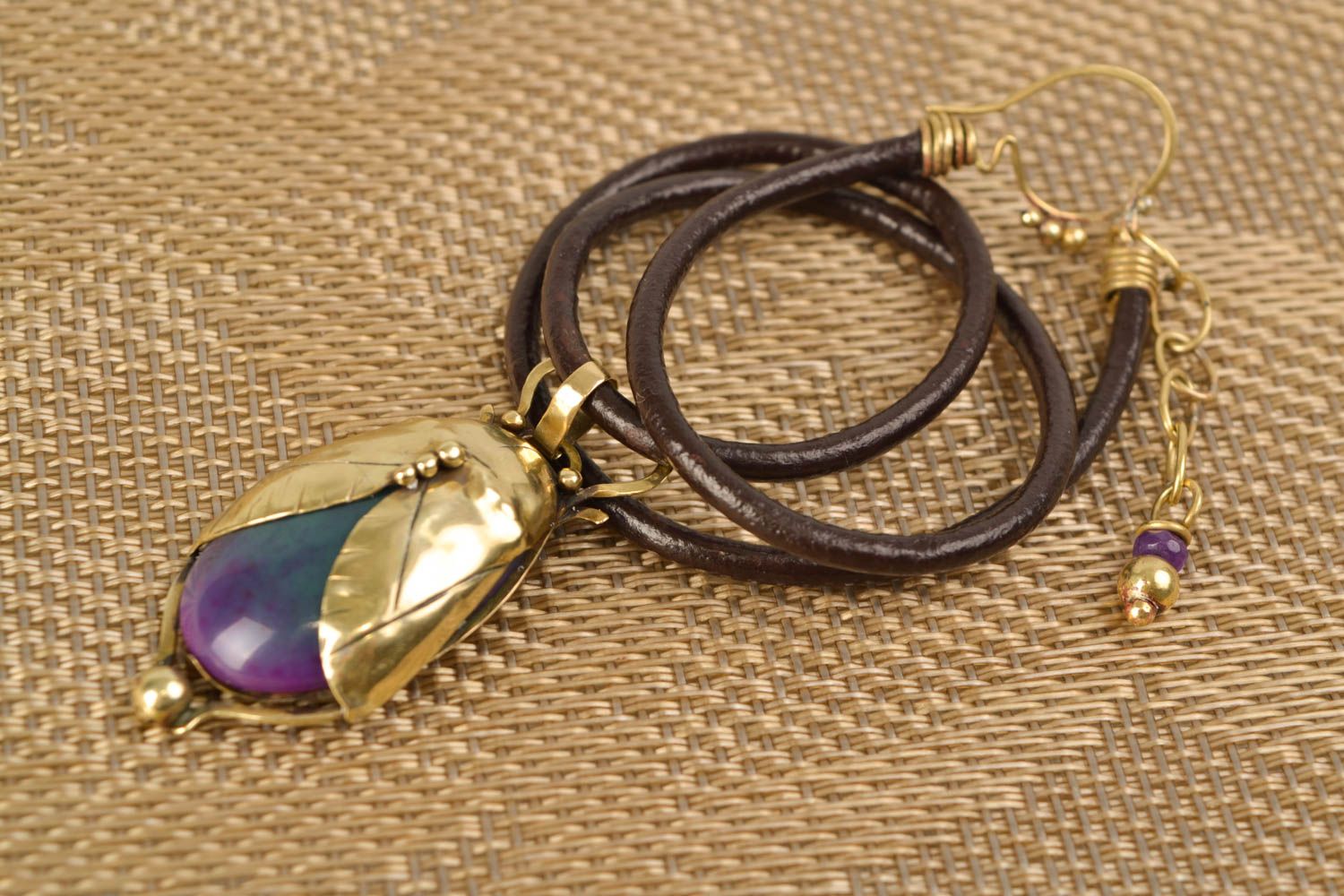 Latten pendant with agate and cord photo 1