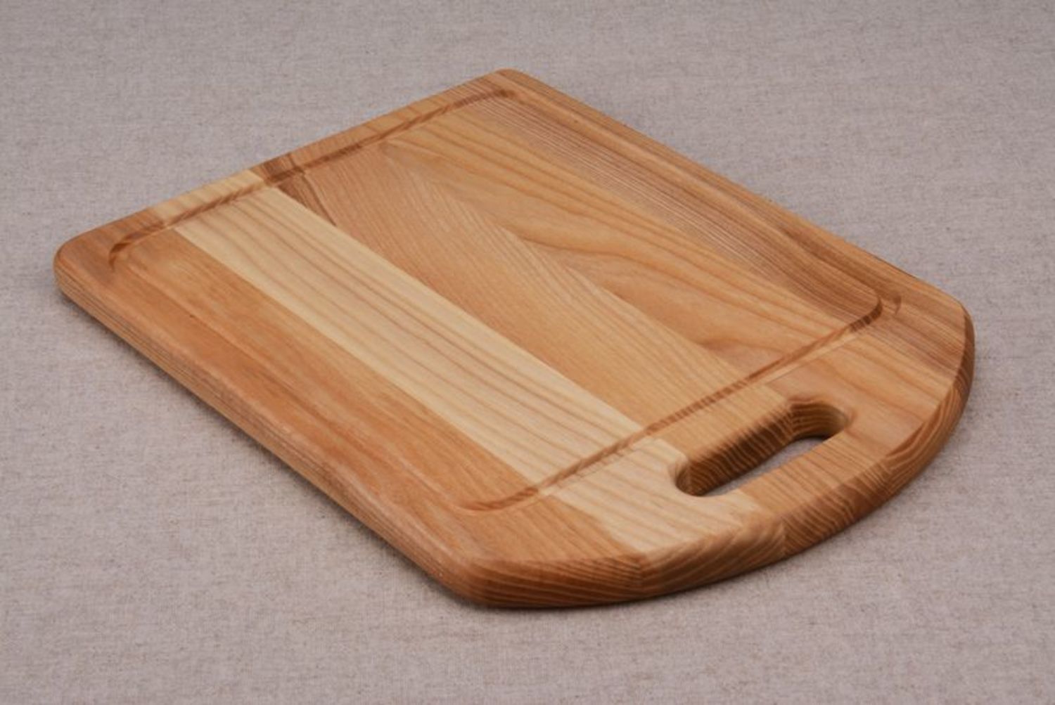 A wooden cutting board photo 5