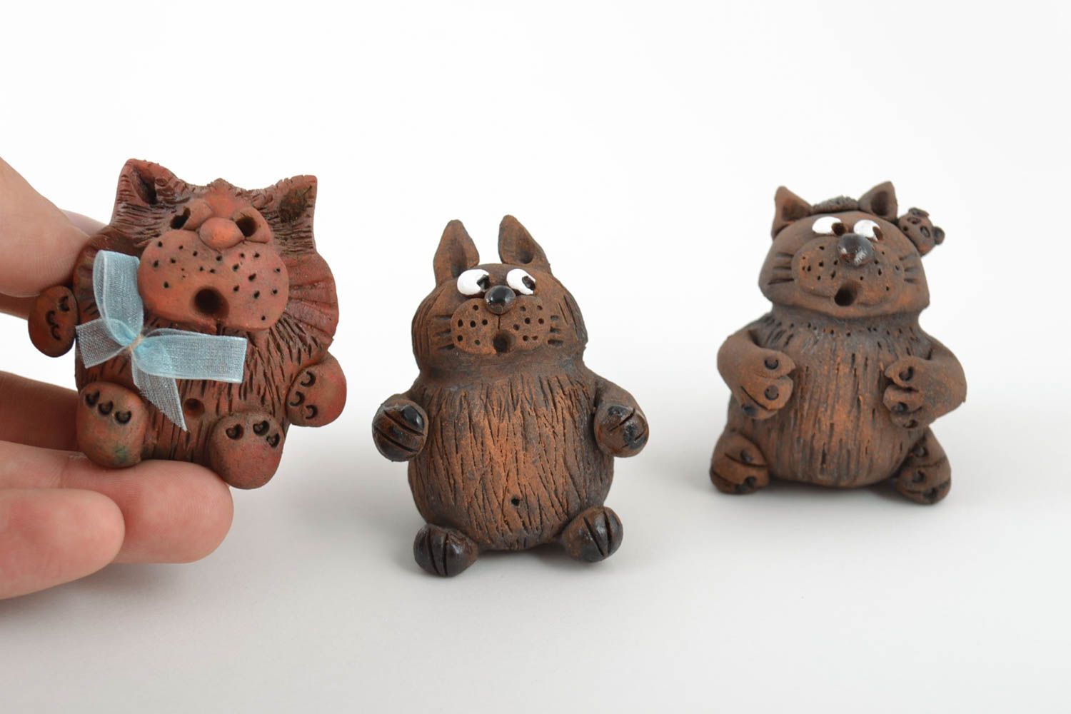 Set of handmade decorative ceramic figurines of cats made of red clay 3 pieces photo 2