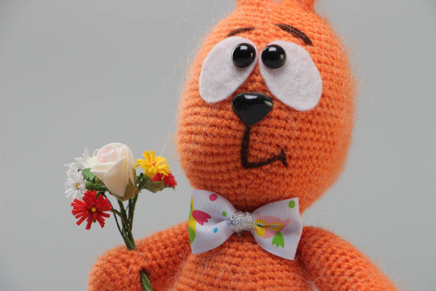 Handmade soft toy crocheted of acrylic threads Orange Rabbit with bouquet photo 3