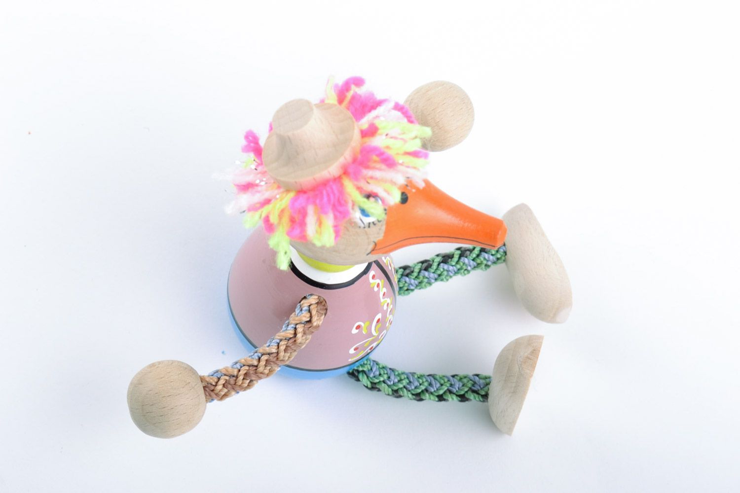 Красочная деревянная игрушка в виде утки ручной работы расписанная эко красками фото 4