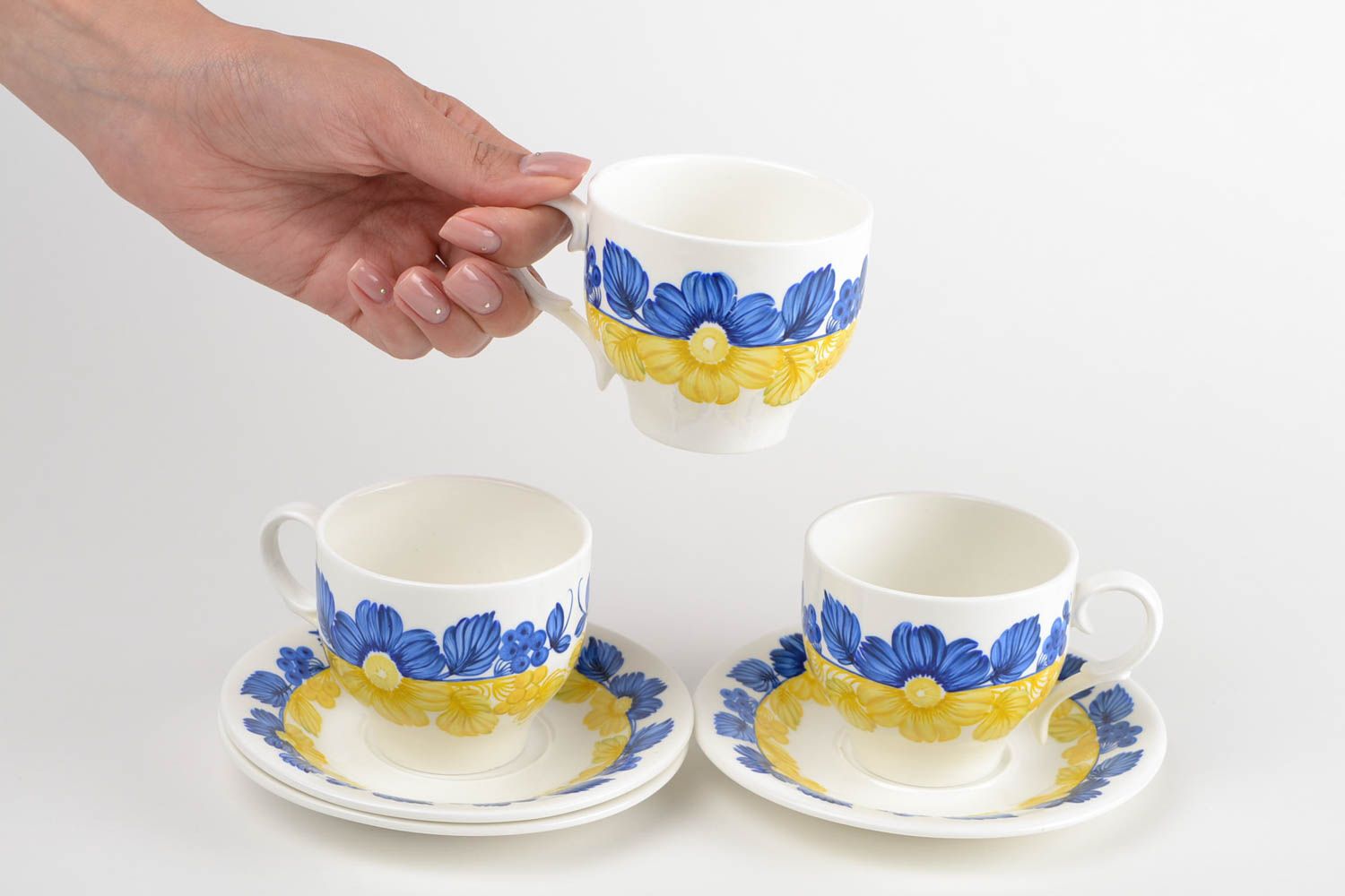 Set of 3 three porcelain white, blue, and yellow colors drinking cups with saucers photo 2