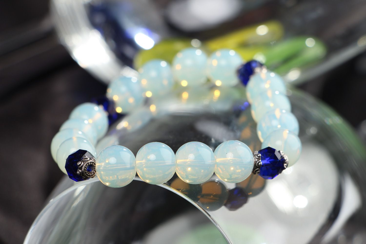 Handmade stretch wrist bracelet with moon stone and blue glass beads for women photo 4