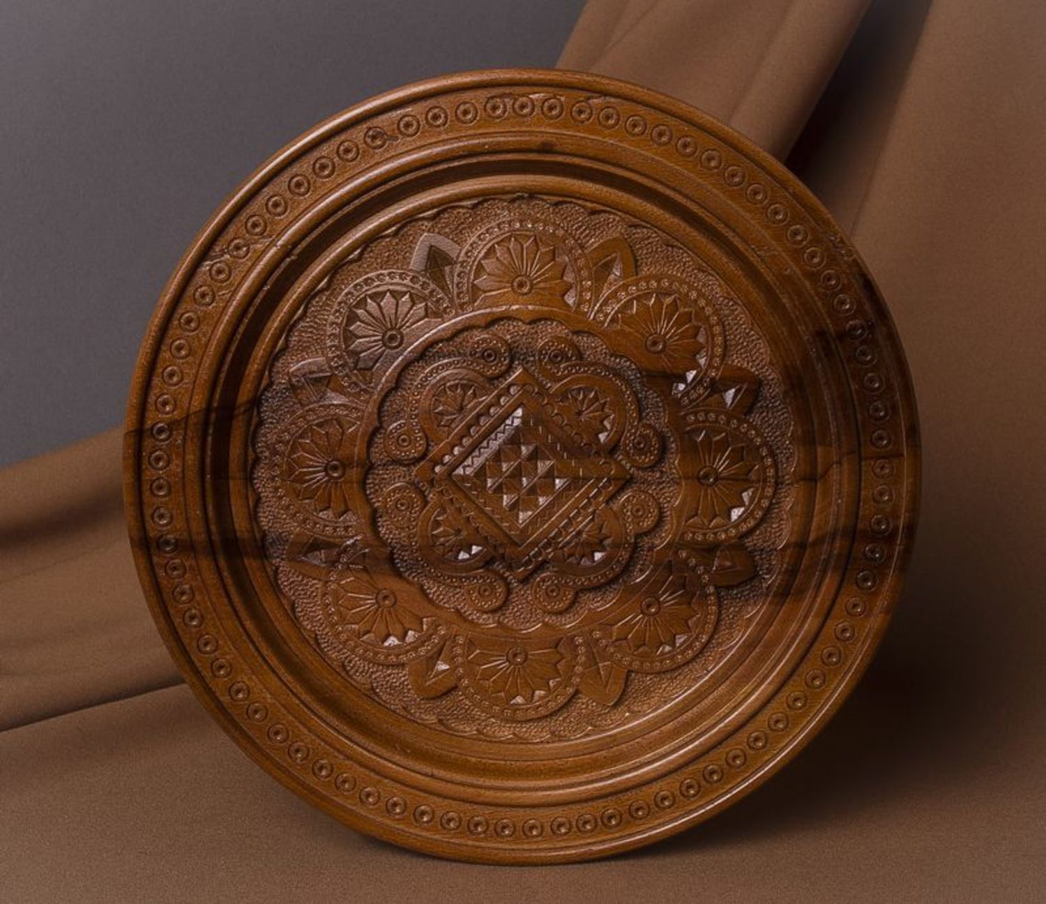 Decorative plate made of wood photo 1