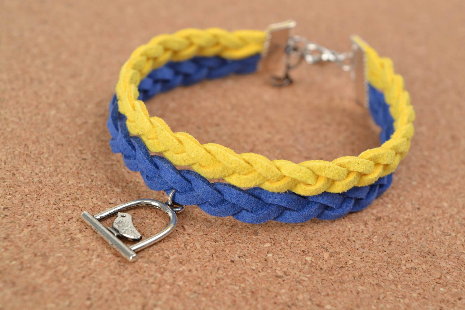 Bright handmade woven suede cord bracelet with bird charm photo 1