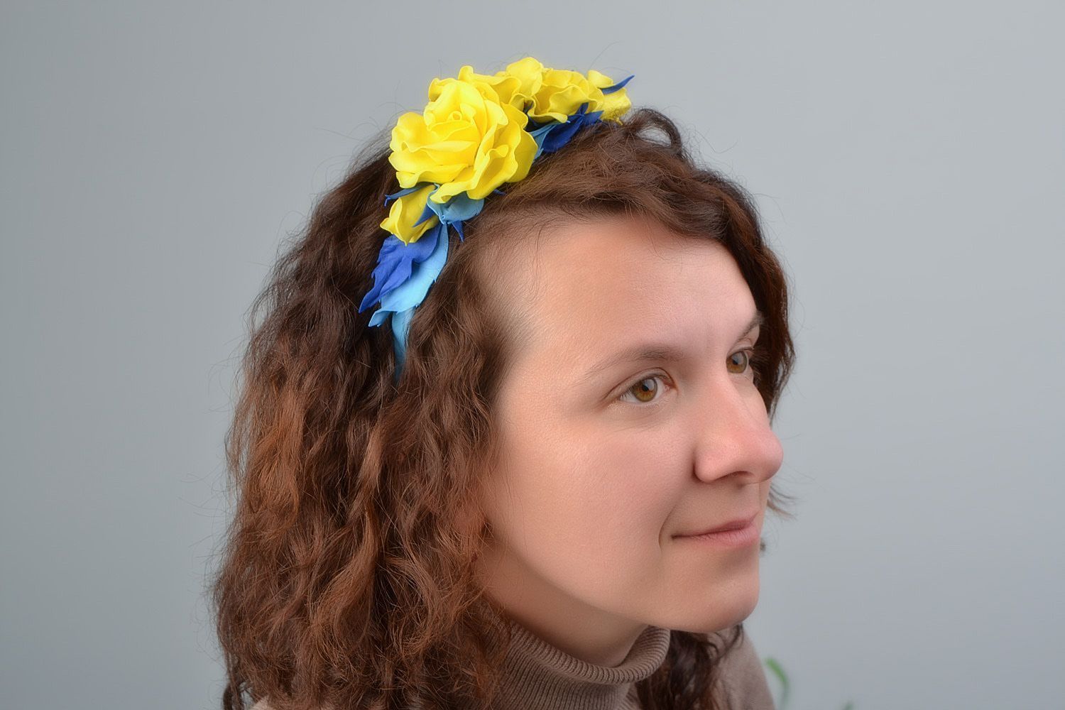 Handmade designer headband with plastic suede roses in yellow and blue colors photo 1