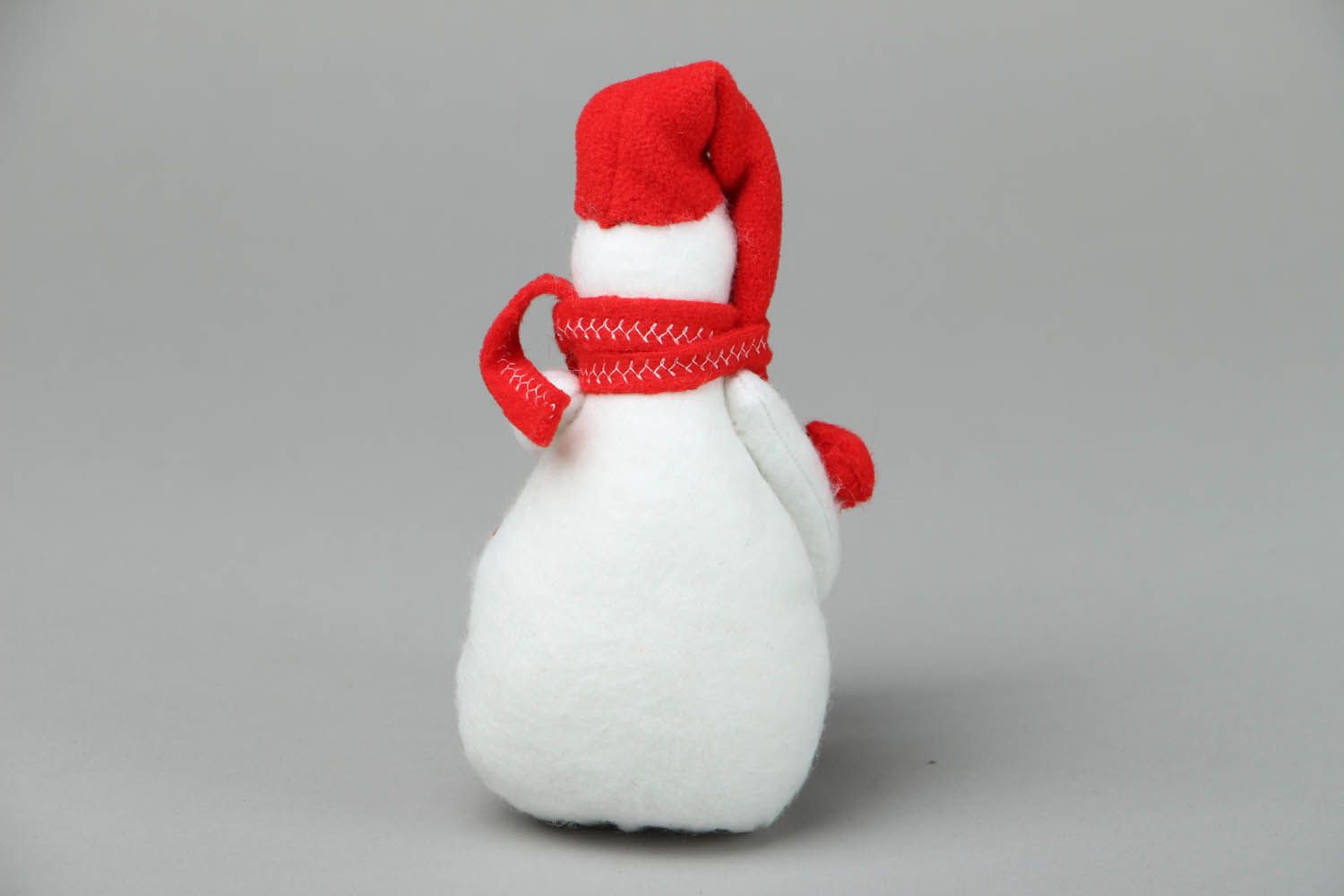 Snowman in a red scarf photo 3