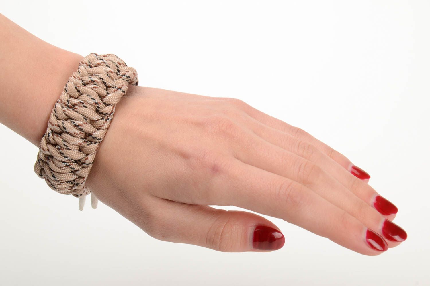 Handmade broad survival wrist bracelet woven of parachute cord of beige color  photo 5