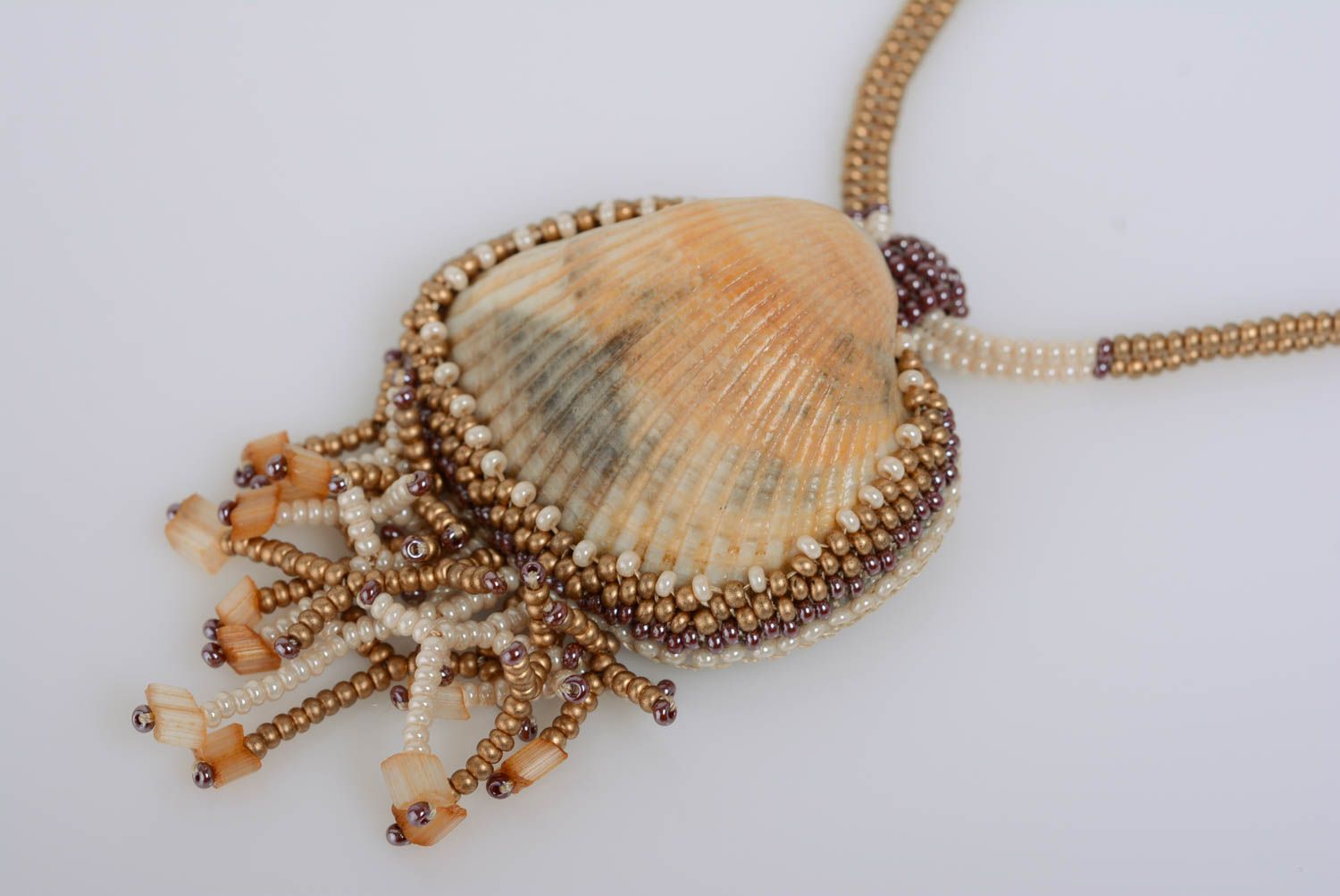 Unusual handmade women's designer beige beaded pendant with seashell photo 2