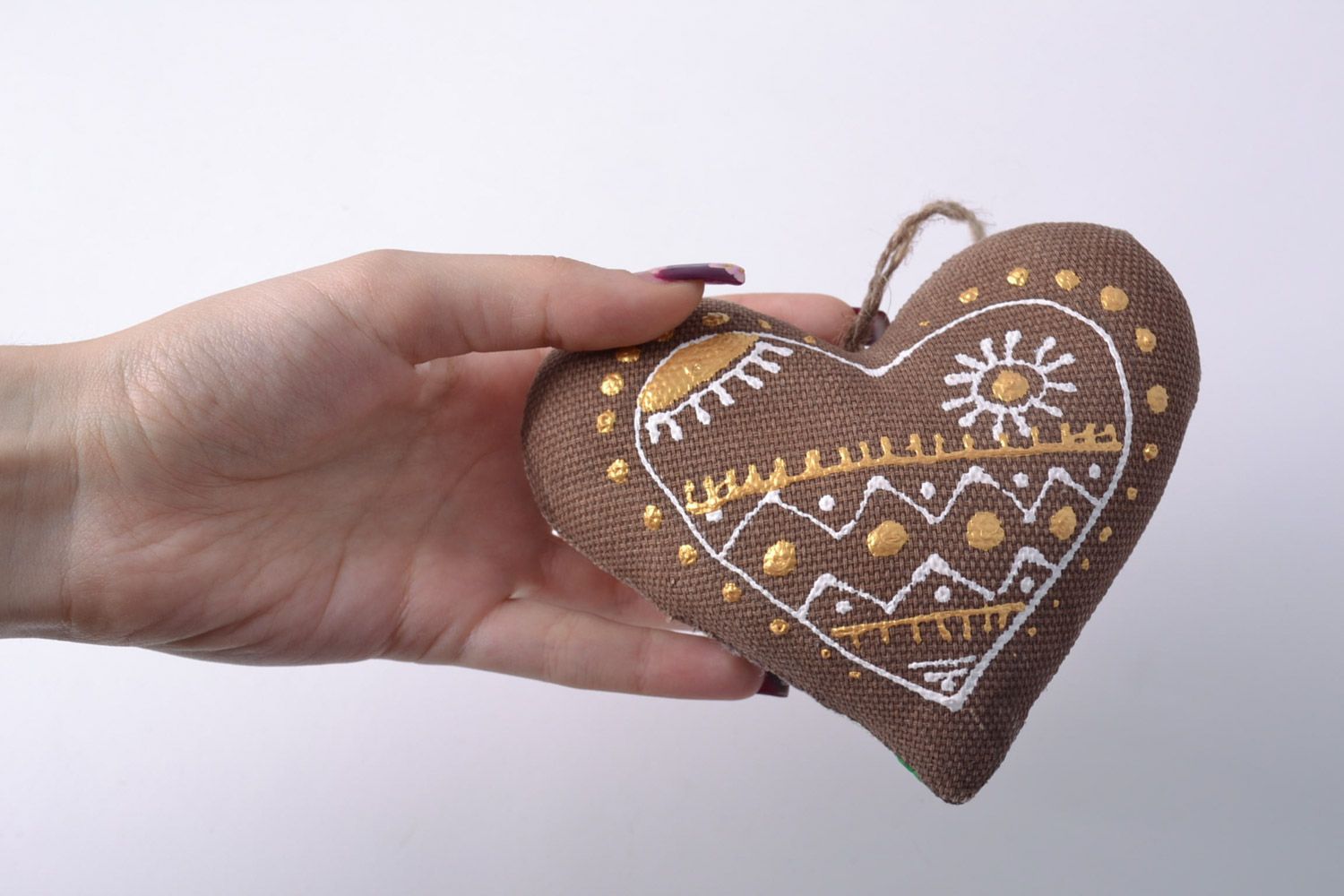 Homemade soft heart decoration sewn of fabric with ornaments and coffee aroma photo 4