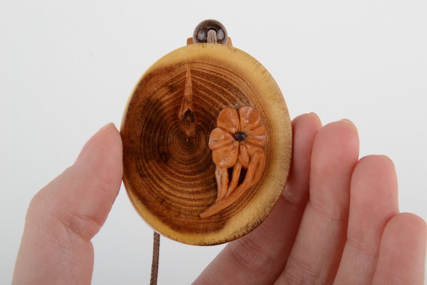Large handmade varnished wooden neck pendant of oval shape with cord for women photo 5