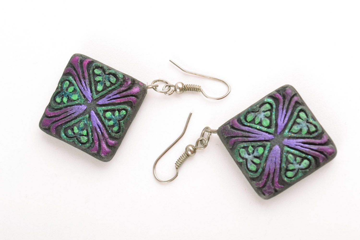 Handmade ceramic rhombus-shaped dangling earrings of black color with ornament photo 5