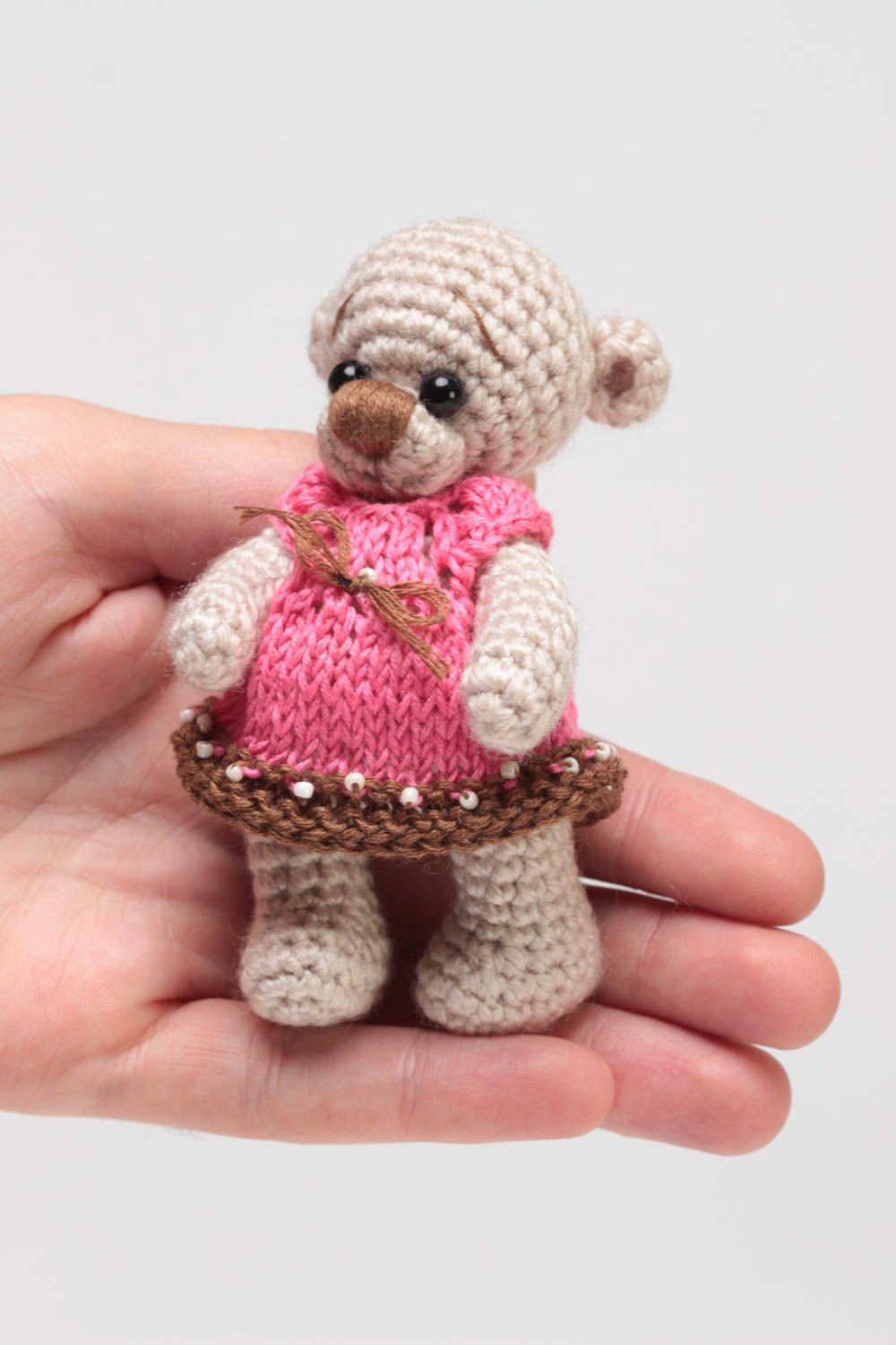 Handmade small soft crocheted toy beige bear girl in pink dress for children photo 5