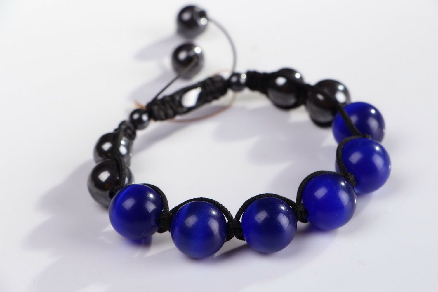 Bracelet en perles œil de chat bleues et hématite photo 2