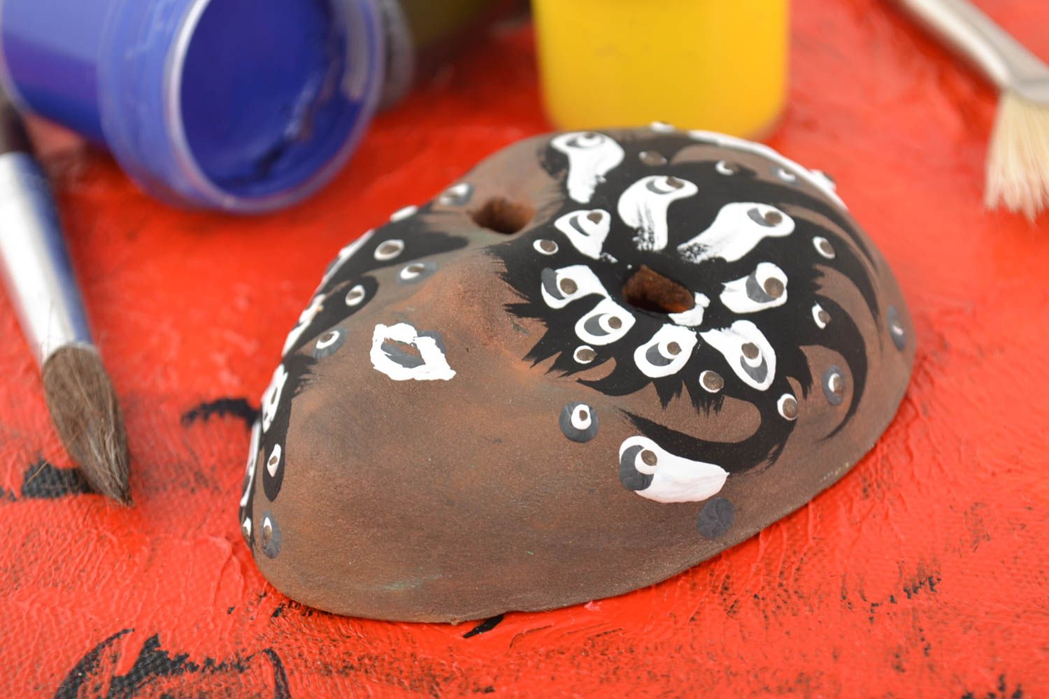 Handmade wall pendant brown painted carnival mask made of clay photo 1