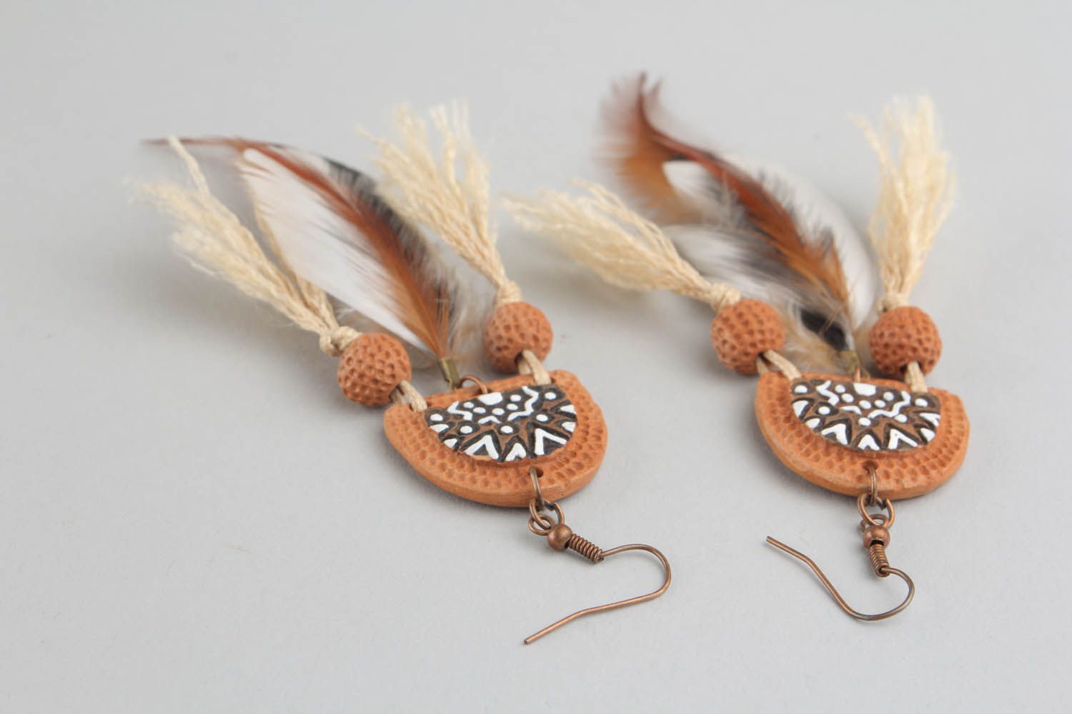 Long earrings with feathers photo 3