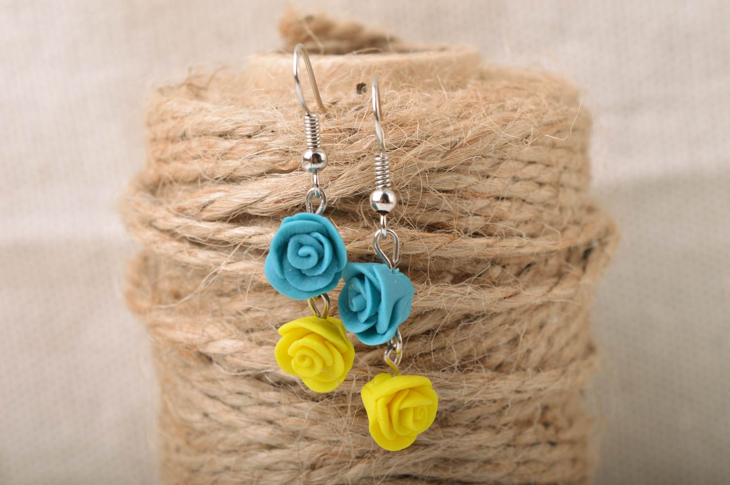 Handmade designer dangle earrings with blue and yellow cold porcelain roses photo 1