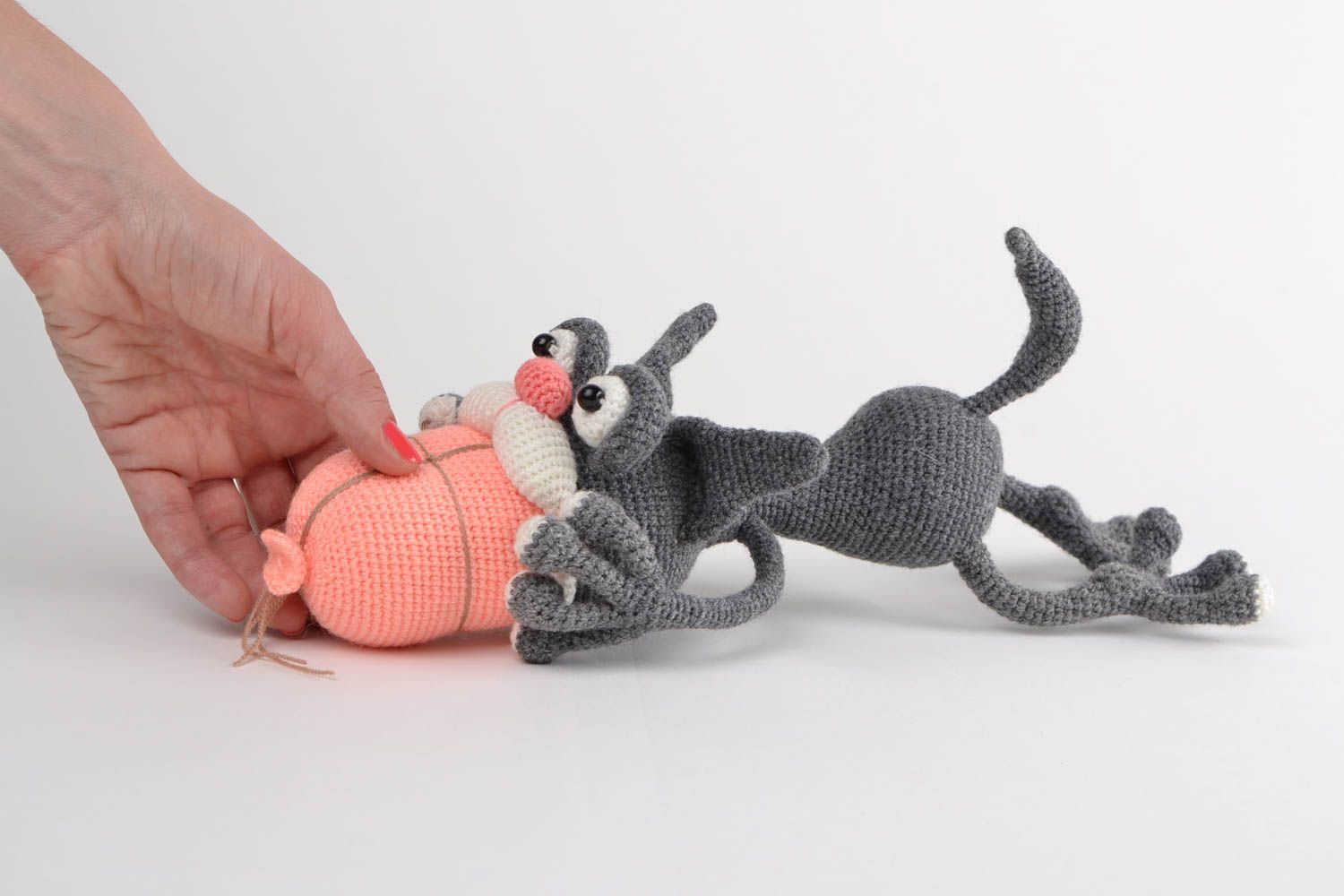Handmade soft toy crocheted of acrylic threads funny gray cat and sausage  photo 2