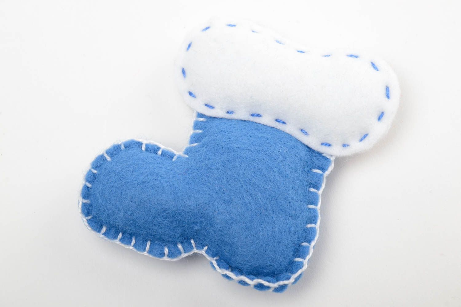Handmade small soft toy in the shape of bootie sewn of blue and white felt photo 2