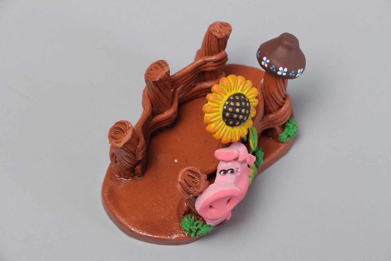 Handmade decorative ceramic napkin holder in the shape of a pig and a fence photo 3