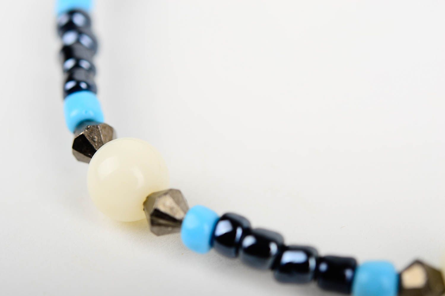 Elastic stretchy unisex bracelet made of black and blue beads  photo 5