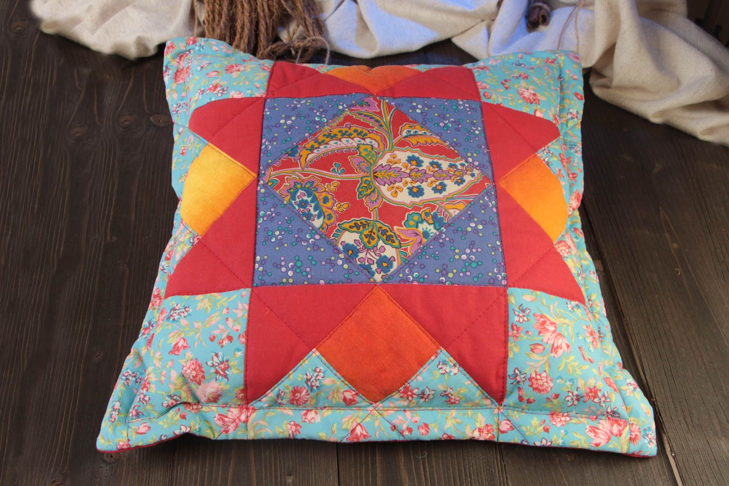 Beautiful handmade designer patchwork accent pillow sewn of cotton fabric photo 1