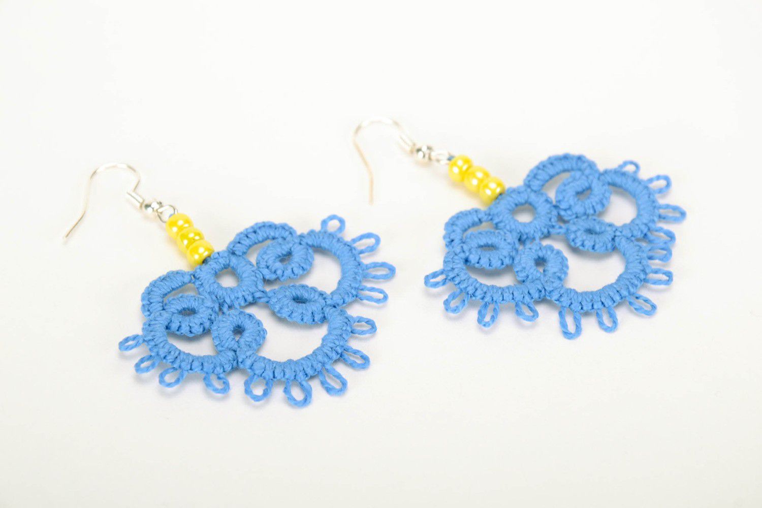 Handmade lace earrings made using tatting technique photo 1