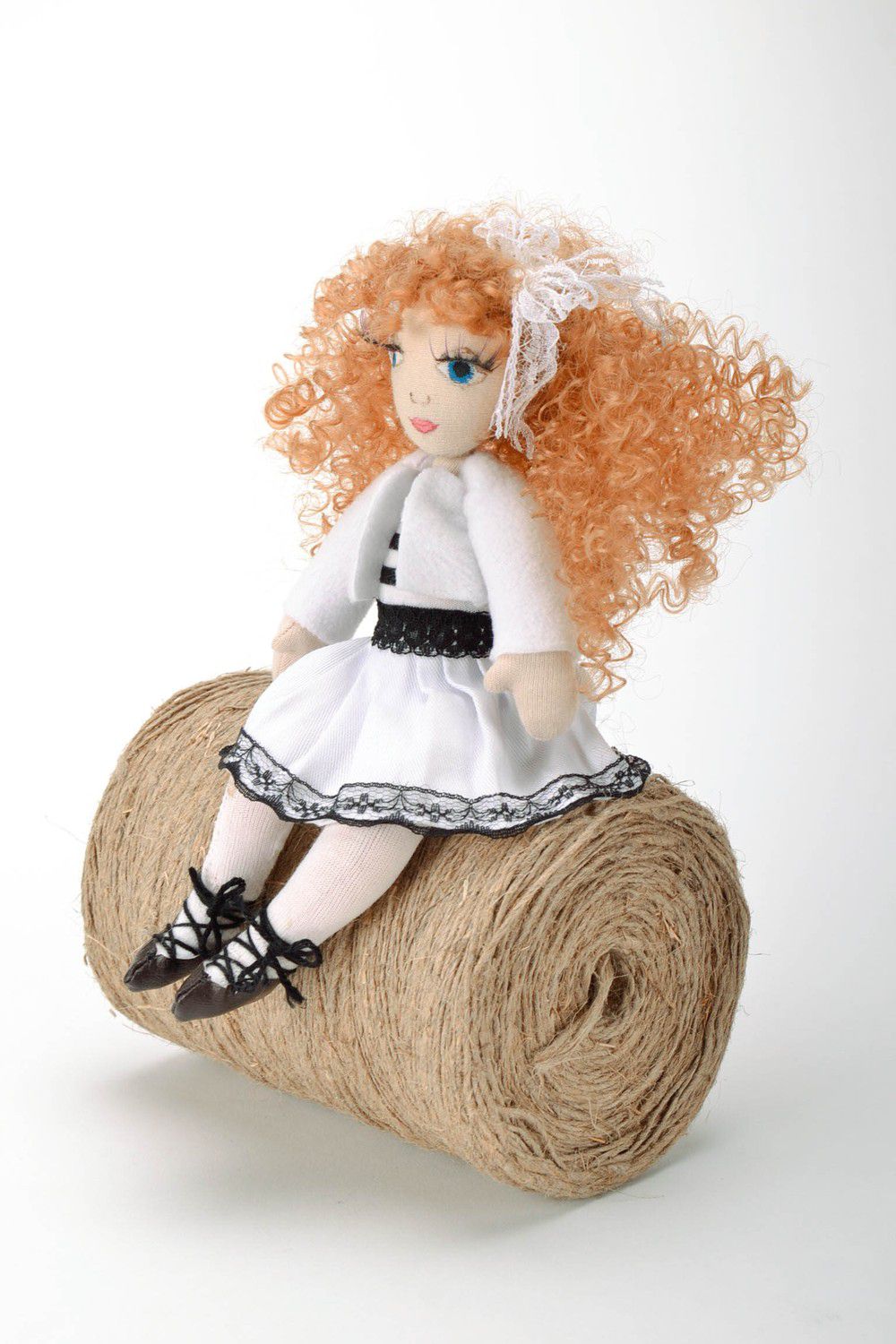 Sitting doll in white dress photo 2