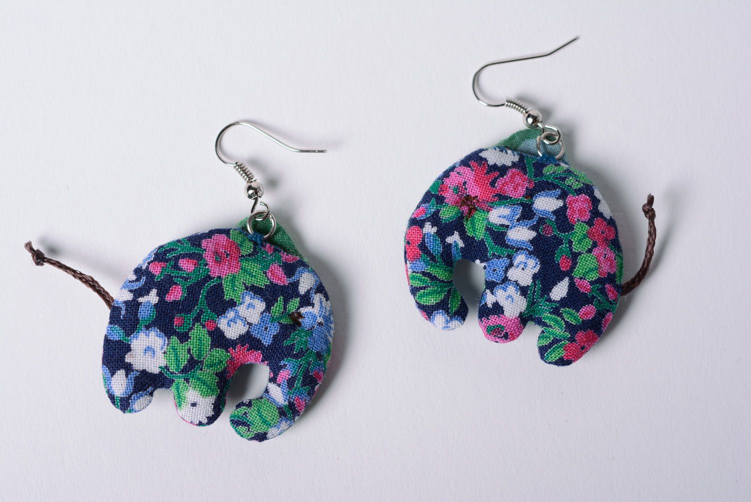 Beautiful earrings hand made of linen and cotton fabric in the shape of elephants photo 5