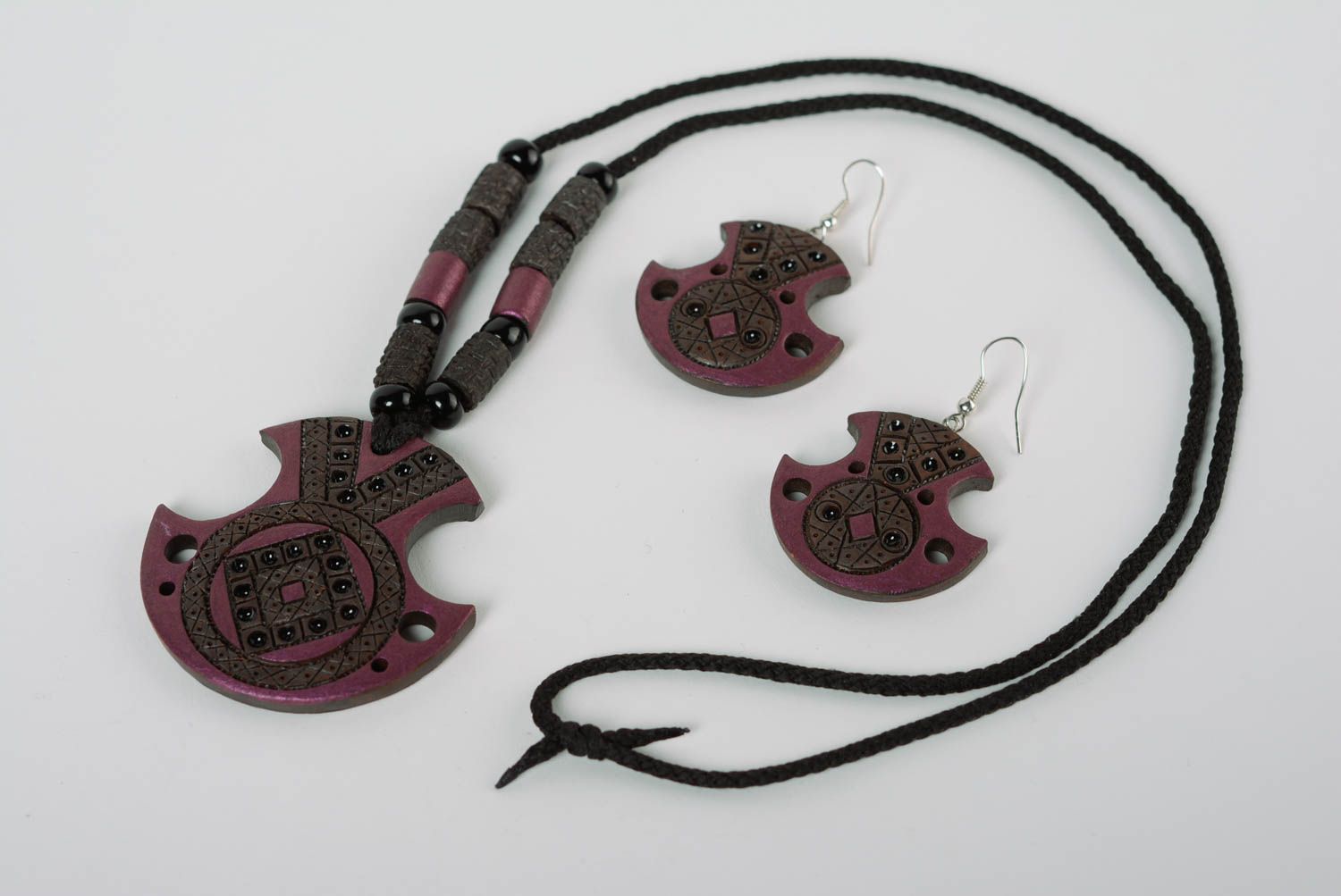 A set of handcrafted unique earrings and necklace made of clay with colored enamel paintings photo 1