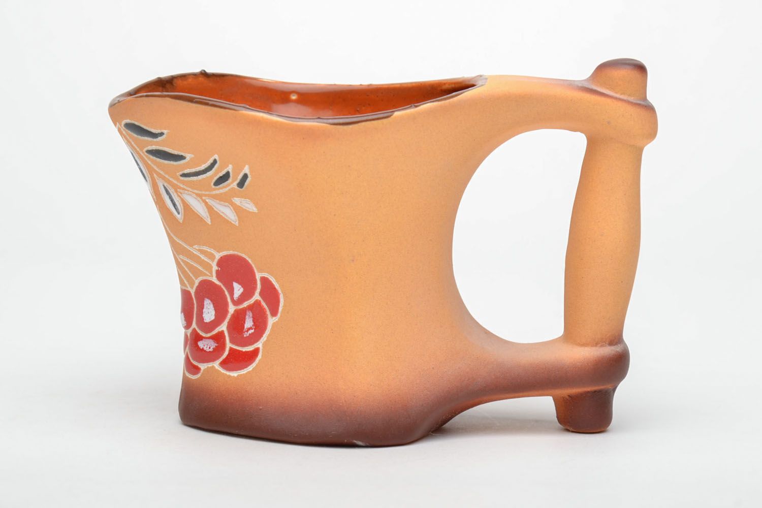 Handmade clay coffee cup with glaze in terracotta color with large handle and flower pattern photo 2