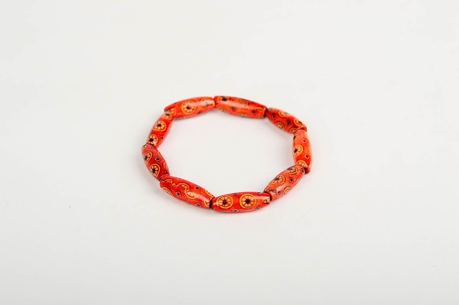 Wooden red beaded handmade wrist bracelet on elastic cord for girls and women photo 1