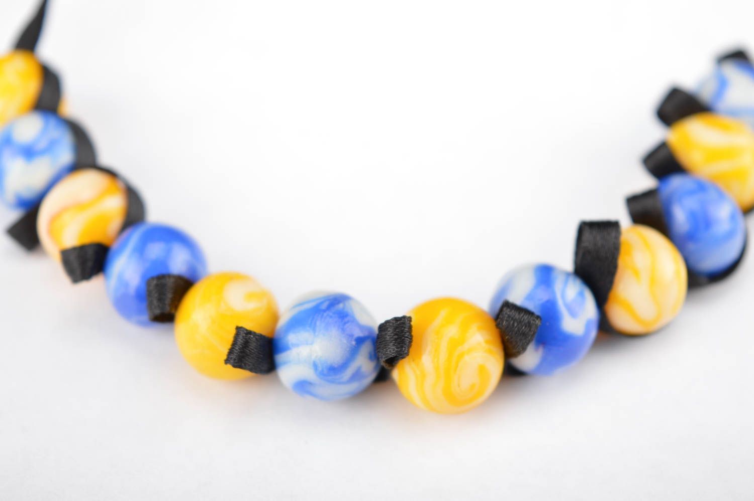 Stylish handmade yellow and blue beads bracelet on a black textile cord for her photo 3